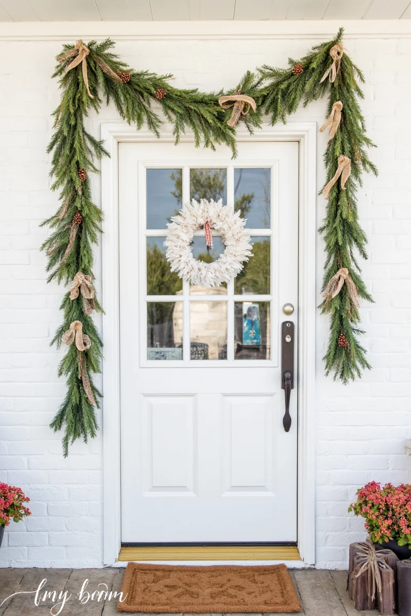 Final decorated door with festive garland and lights