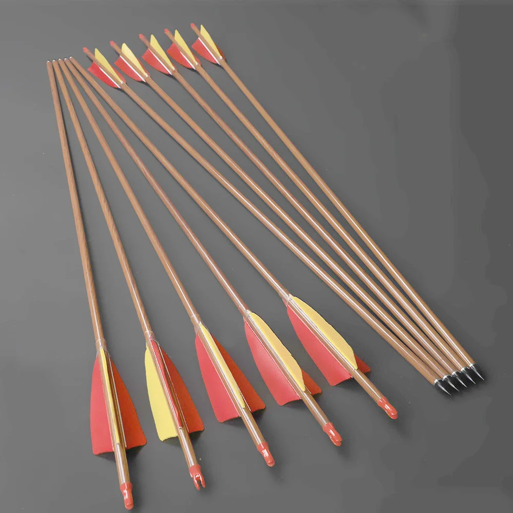 

Cheap ID6.2mm wood skin Carbon Arrow spine 500 with 4inches Turkey Feather Pure Carbon Arrows Shaft Archery Arrow Bow, Wooden, red and yellow