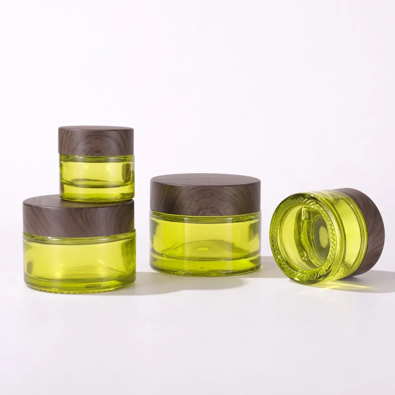 

Wholesale green glass 50 g cosmetic container cream jar 50ml