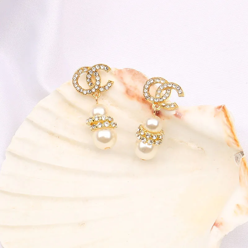 

Designer earrings popular brands New pearl earrings luxury earrings, Yellow color