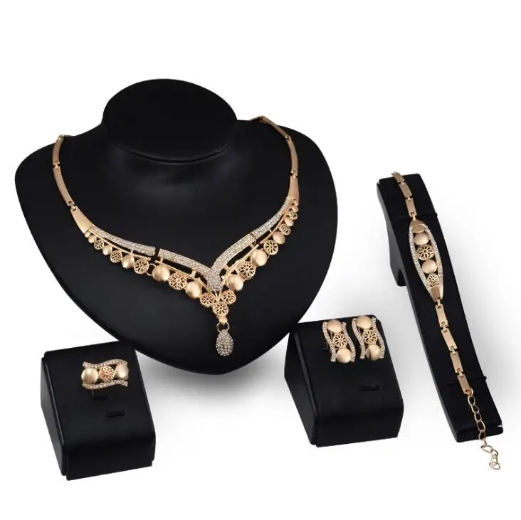 

Fashion Indian Gold jewelry set Necklace earrings bracelet and ring Four pieces jewelry set Wholesale X4042