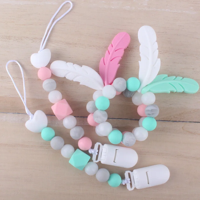 

BPA Free Baby Chewable Food Grade Silicone Feather Pacifier clip Teething Baby Teething Toy