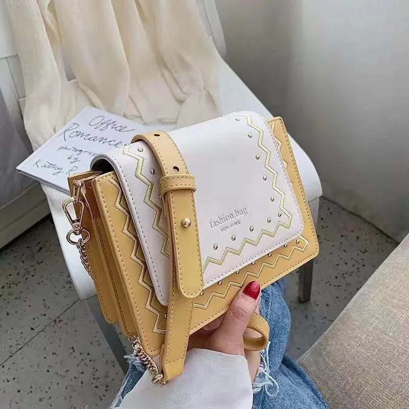

Summer High Fashion Ladies Vegan Leather Crossbody Bag with rivet and embroidery