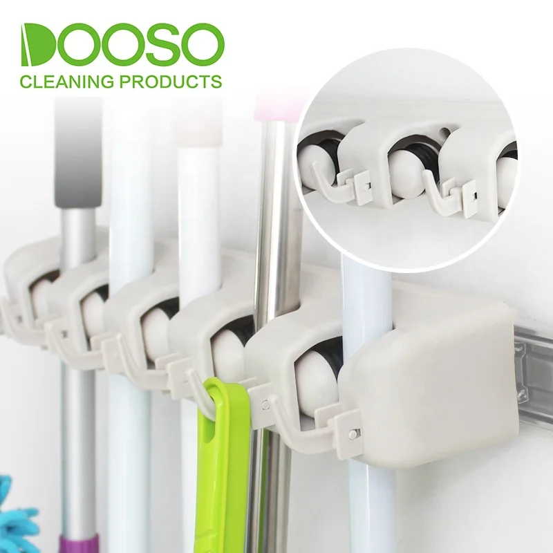 

Magic Slide Tool Holder Storage Rack broom and mop holder to convenient use in Kitchen Bathroom, Colors