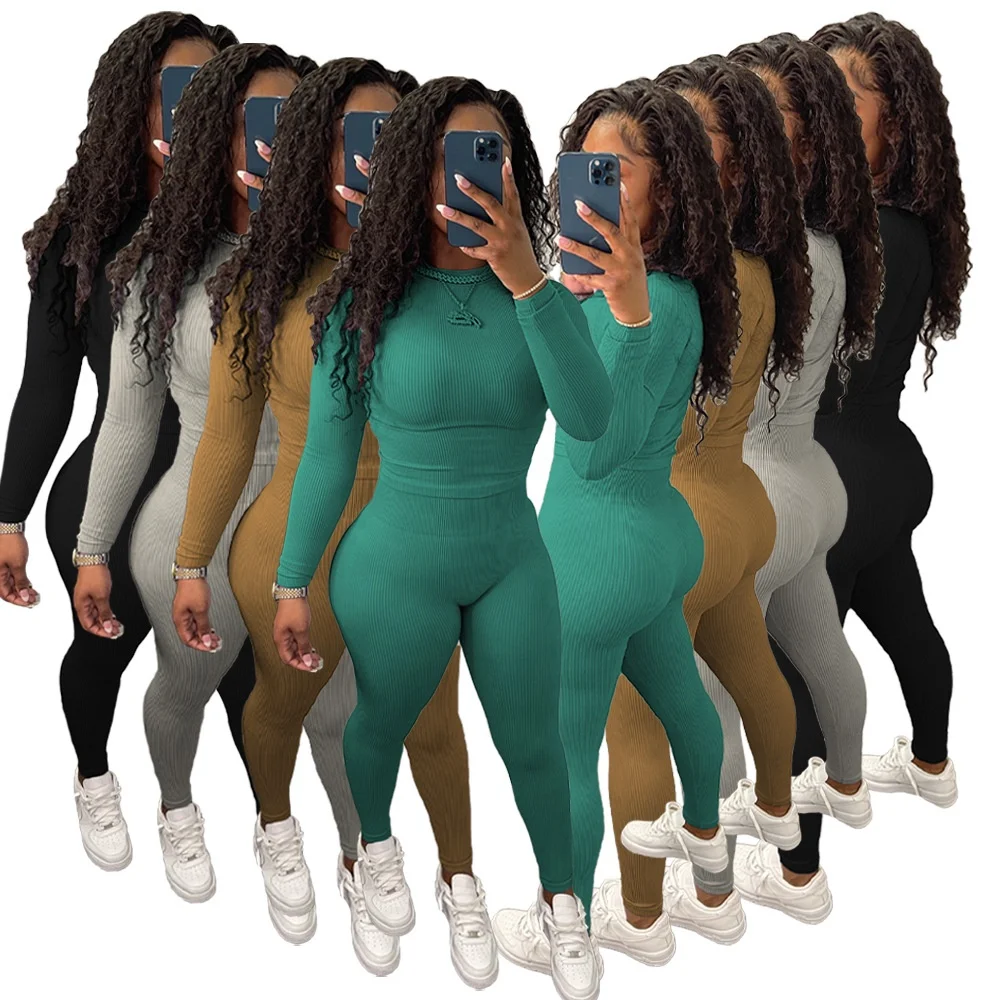 

spring 2022 women s clothing Solid Color Stretchy Tight Suit Long Sleeve O-Neck Ribbed Yoga Two Piece Pants Set Women