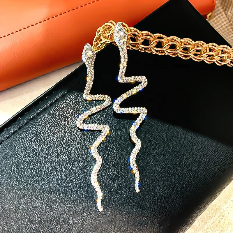 

Hot Sale Fashion Jewelry Exaggerated Shiny Crystal Earrings Personality Snake Bar Party Earrings for women, Picture shows