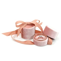 

Unique Pink Round Small Velvet Jewelry Gift Ring Box with Ribbon