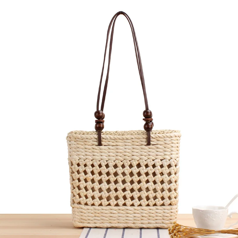 

2021 Summer New Hand Weave Hollow Design Square Natural Straw Basket Bag for Women Lady Beach Resort
