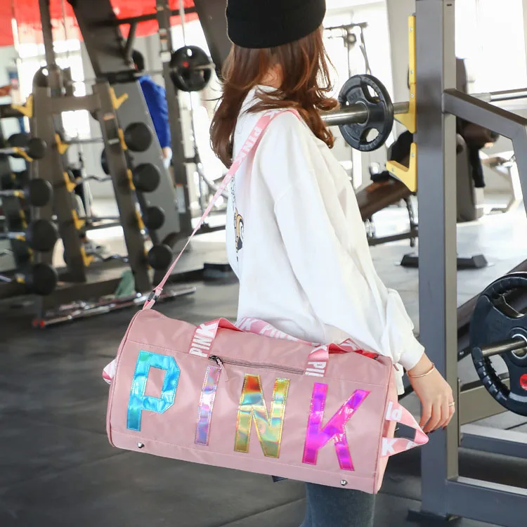 

Wholesale Custom logo waterproof Nylon Sports gym bag pink duffle bags gym