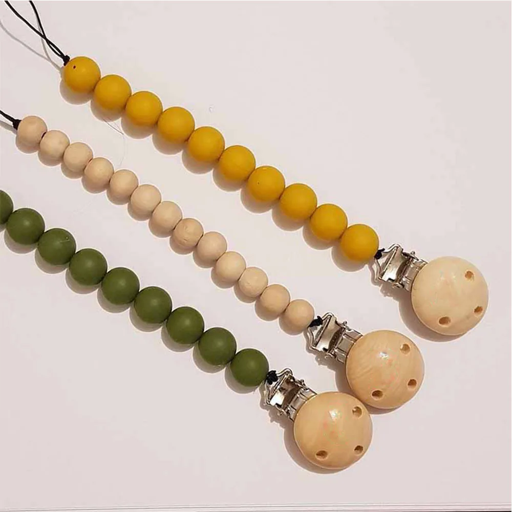 

Wholesale Food Grade Silicone Beads Baby Teething Wooden Pacifier Clips