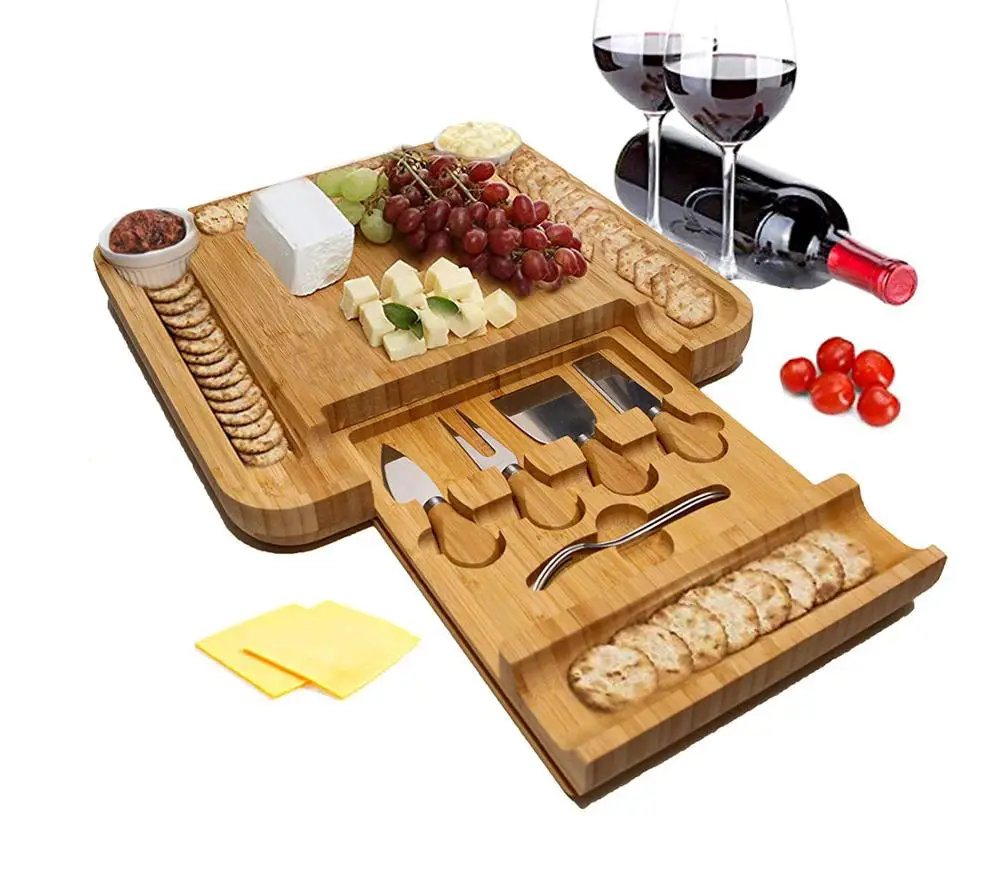 

Service tray with stainless steel cutters in slide out drawer bamboo cheese board set, Natural bamboo color