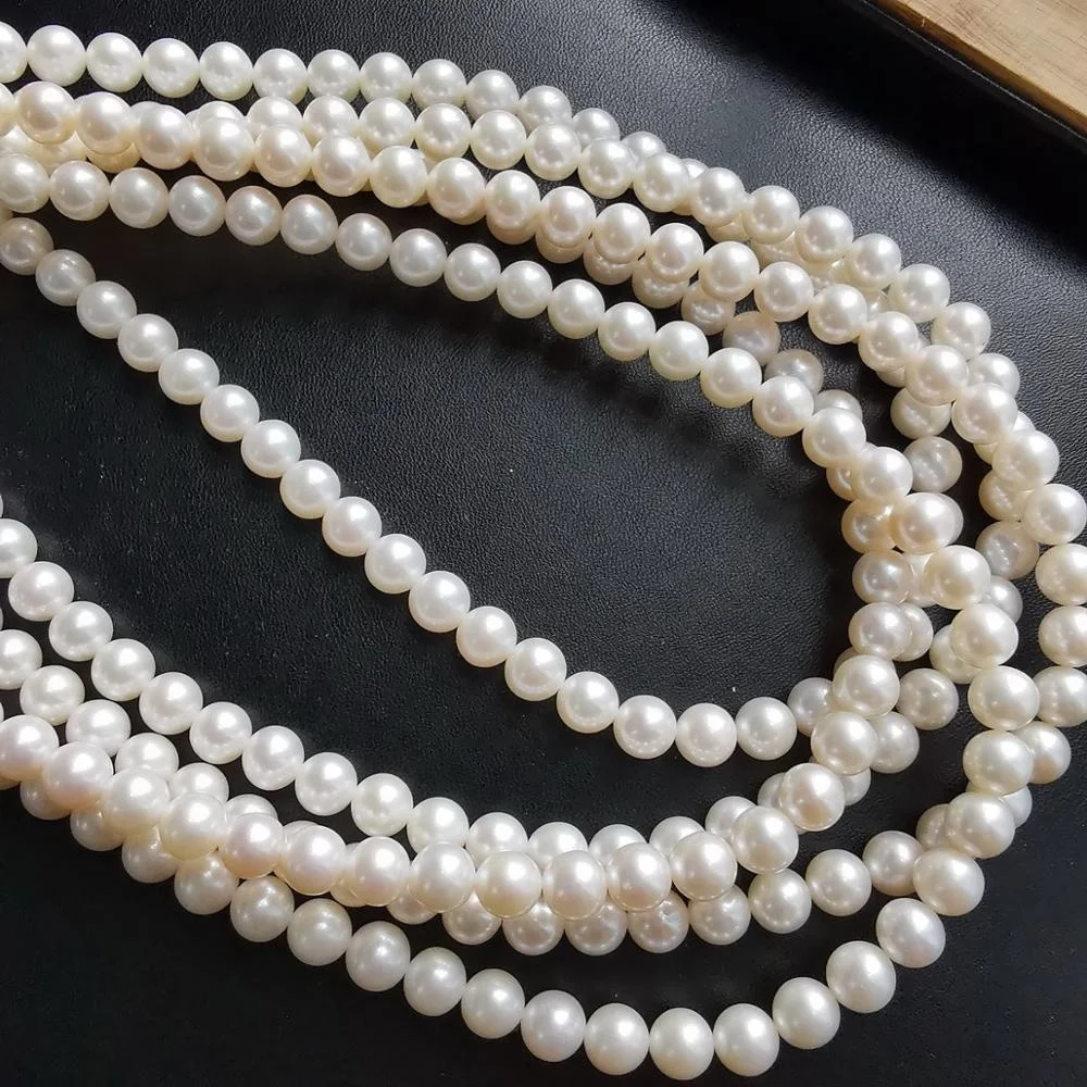 
Top quality 7-8mm round real sweet water pearls strand from top pearl ltd white natural freshwater pearl 16-inch strand string 