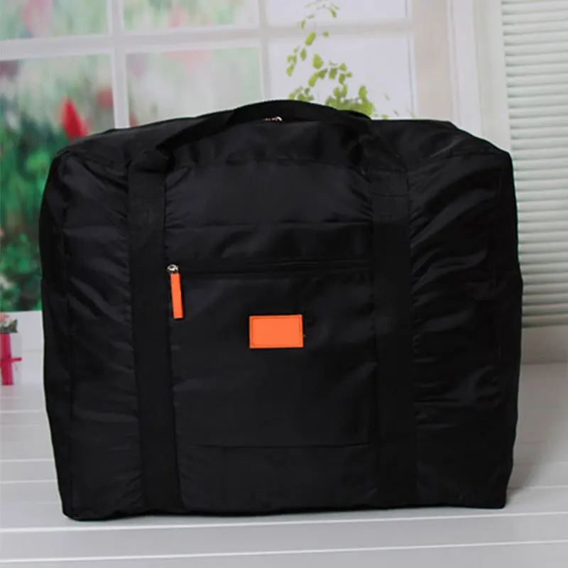 Wholesale low cost foldable versatile waterproof nylon luggage travel storage bag on sale