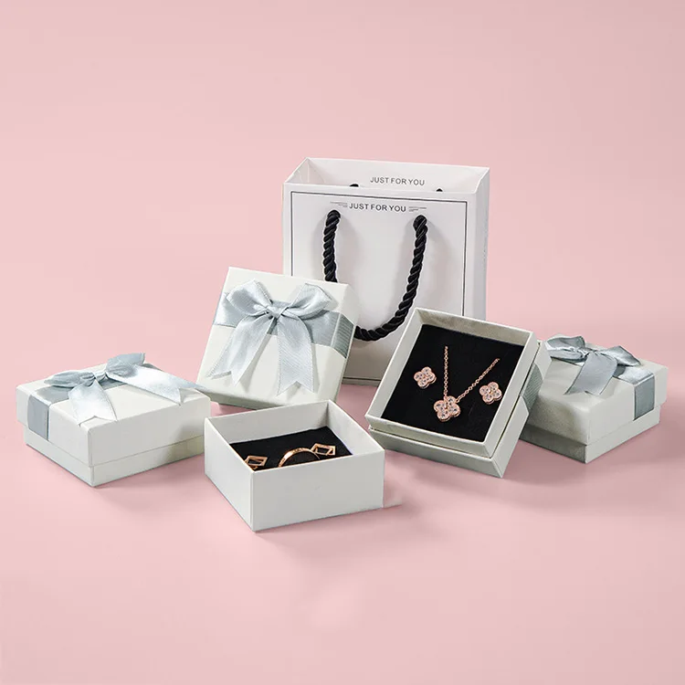 

Custom Logo Printed Luxury Recycled Small Portable Travel Paper Jewelry Gift Box Bow Decoration Jewelry Storage Box