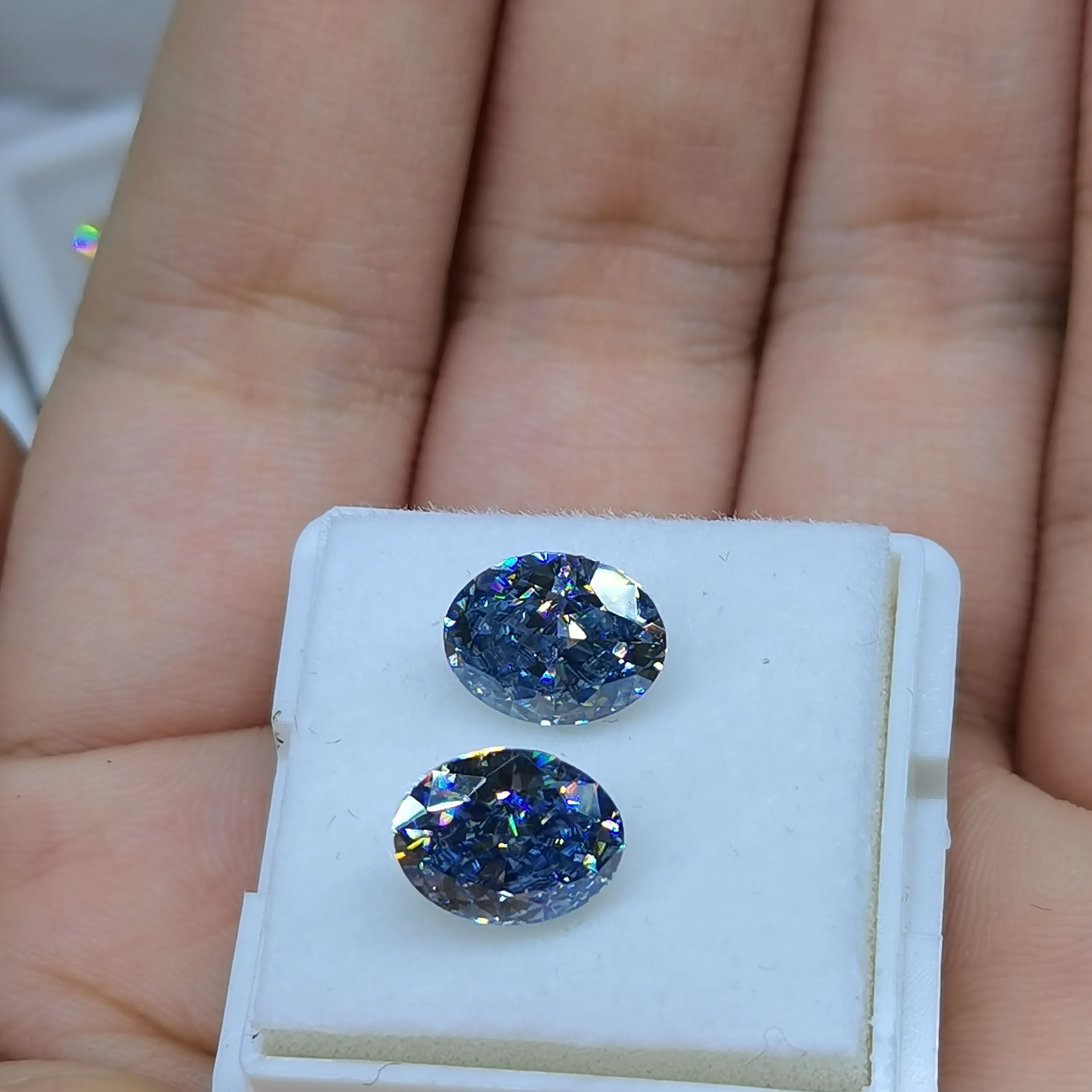 

6X9mm Special Color Hot Sale NEWS Fancy Vivid Blue Crushed Ice Oval Cut VVS1 Professional Manufacturer In Moissanite Supplier