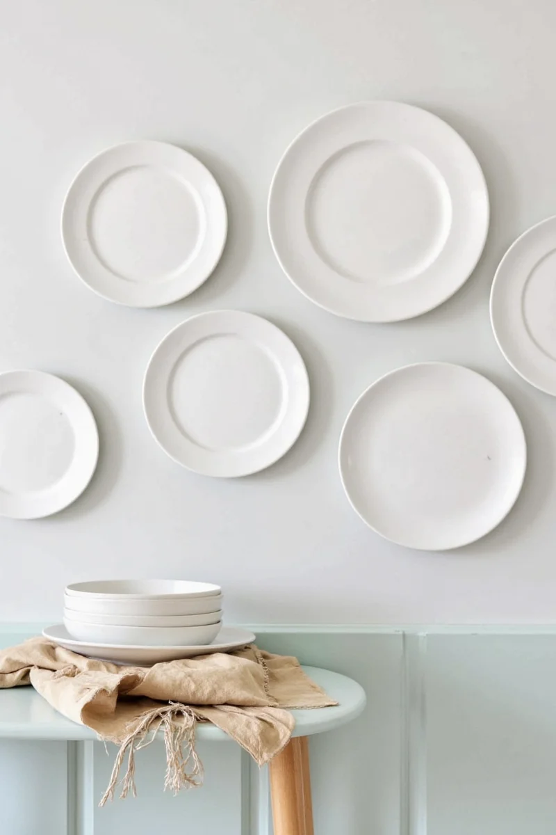 Cute ceramic plates hung using Command strips