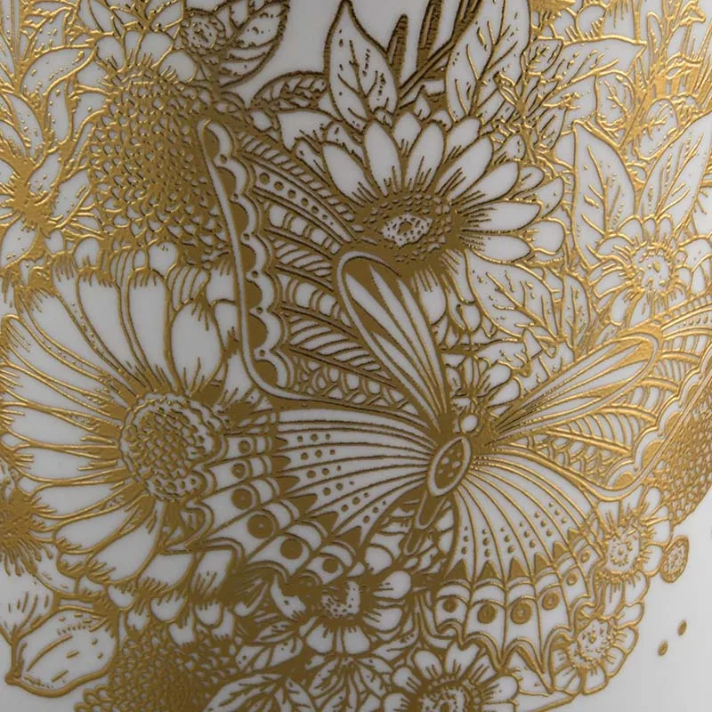white ceramic candle jars with gold printing for Christmas