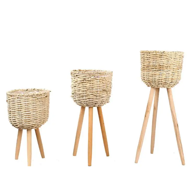 

Wholesale sea grass planter with leg made in China Vintage rattan wicker plant stand Modern design woven wicker flower pots, Natural