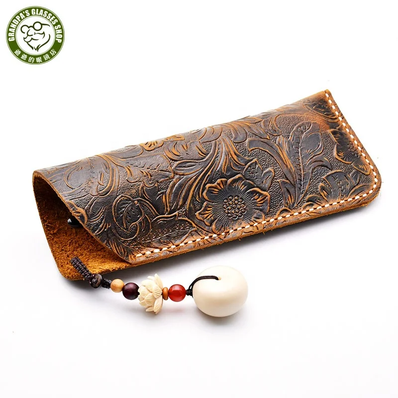 

Wholesale eyeglass bag Fashionable Personalized handmade embossed real leather glasses pouch Portable soft leather glasses case, Shades of brown / ginger yellow / brown