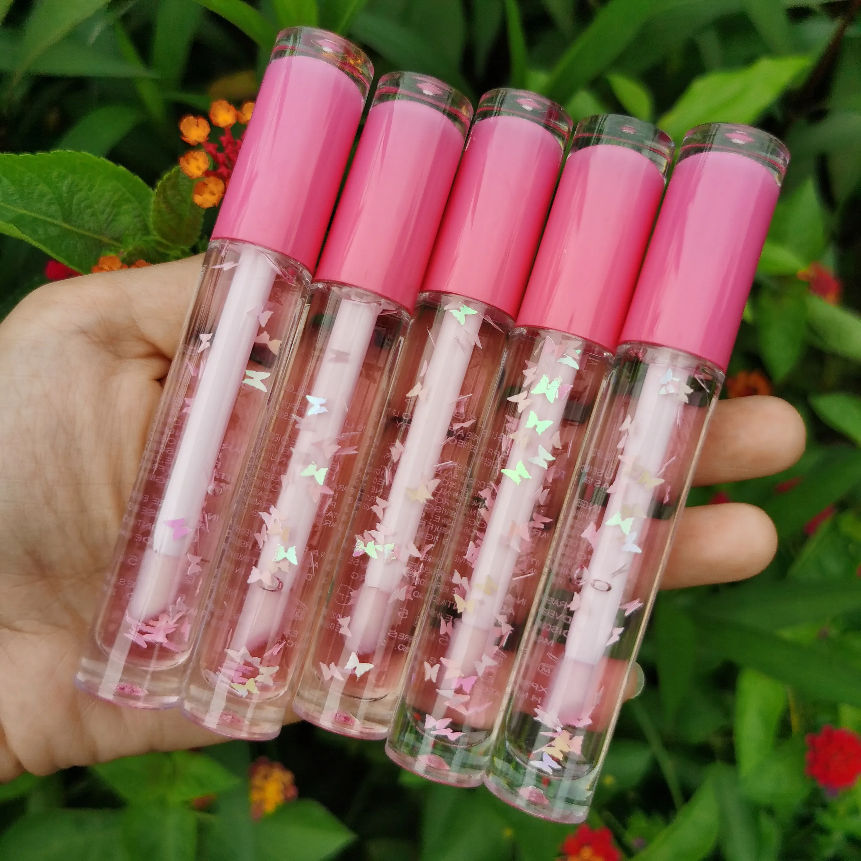 

Lip Gloss Glitter Clear Low Moq Make Your Own Box Filling Hot Selling Pink Crystal Mint Oil Sparkle Butterfly Lipgloss