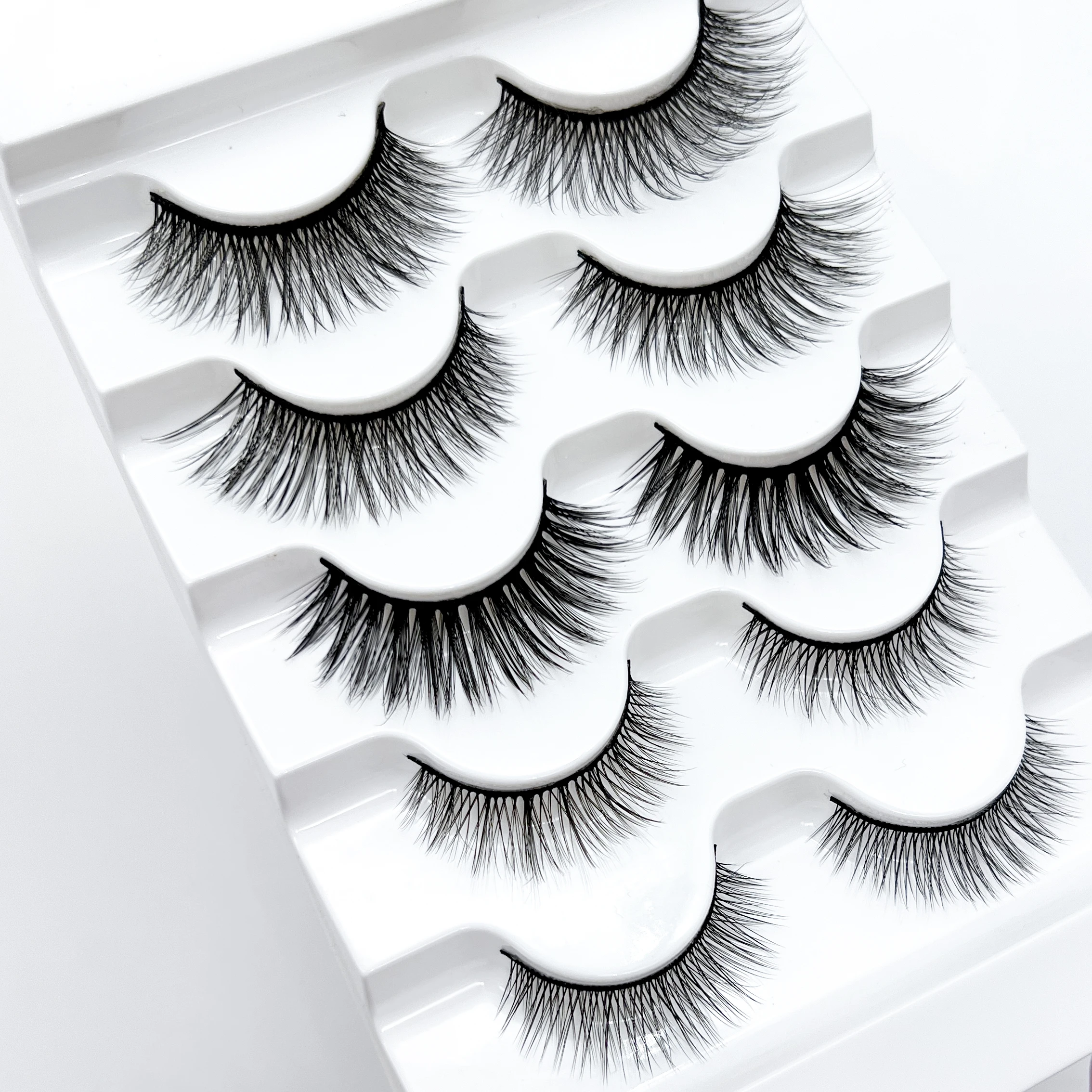 

Wholesale 3D Strip Faux mink Eye Lashes Vendors 25mm Faux mink Lashes and Private Label vegan faux mink Eyelashes