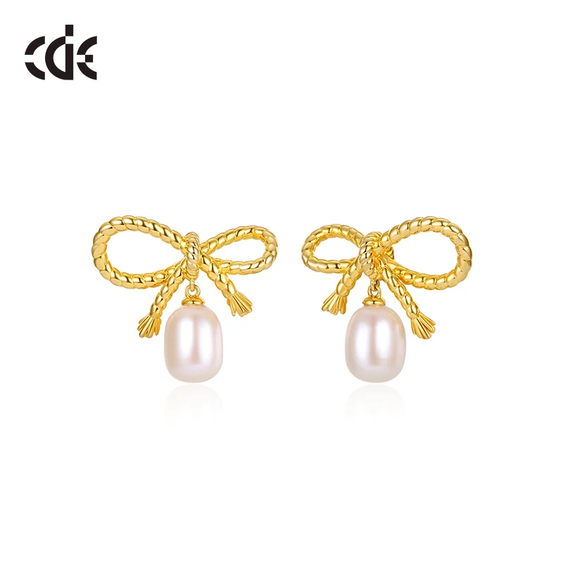 

Women's Elegant 18K Gold Plated 5A Cubic Zirconia Fresh Water Pearl Ribbon Bow Tie Stud Earrings