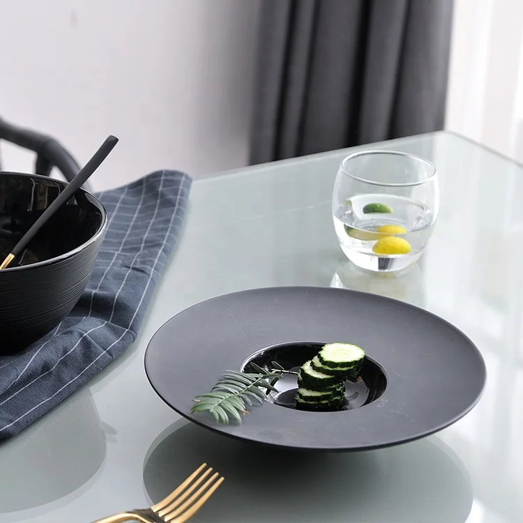 black ceramic pasta plate
