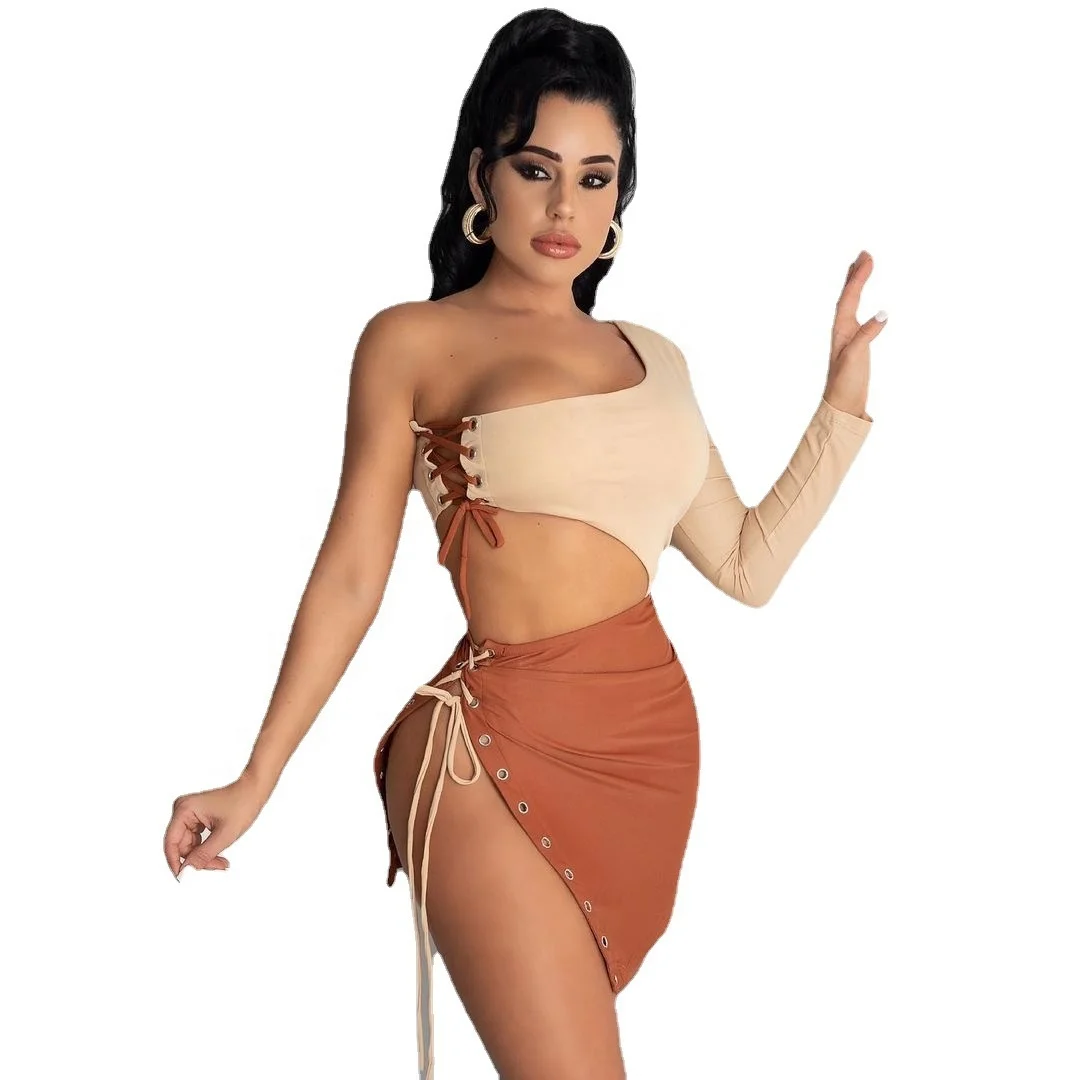 

2021 Sexy Solid Color Bandage Off Shoulder One Sleeve Hollow Out Top Asymmetric Skirt Suits 2pc Set Women Club Party Skirt Suit