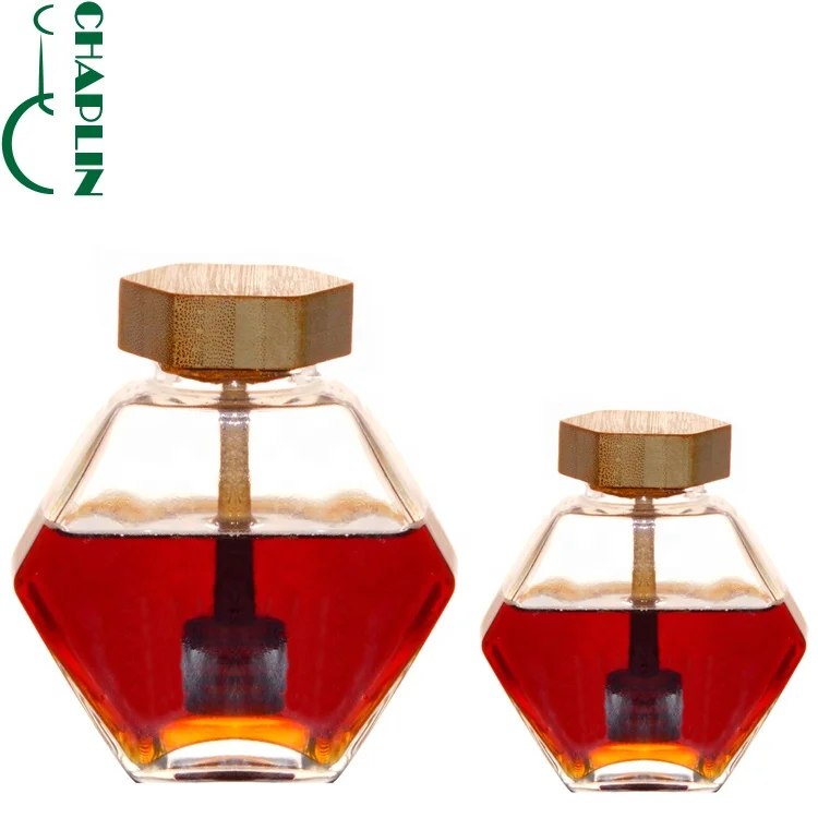 

High-Grade Hexagonal Wood Cover Honey Jar with Stirring Rod Glass Jars For Honey, Customized color