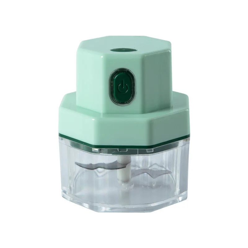 

Mini electric garlic crusher in family restaurant garlic maker