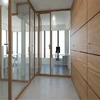 Glass partition clamp with toilet partition door lock