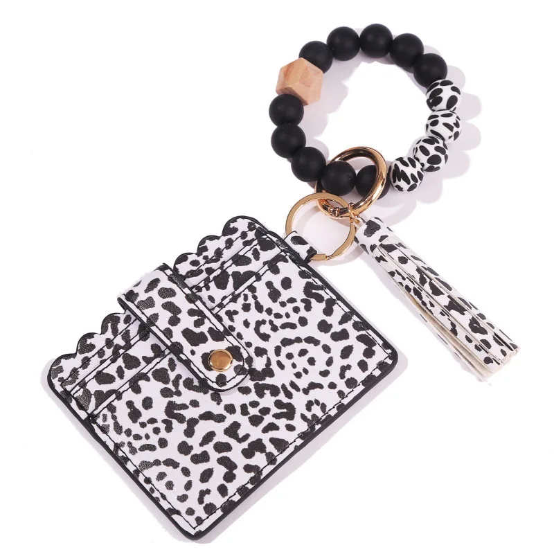 

Silicone beaded pu leather belt tassel bracelet keychain card bag bracelet