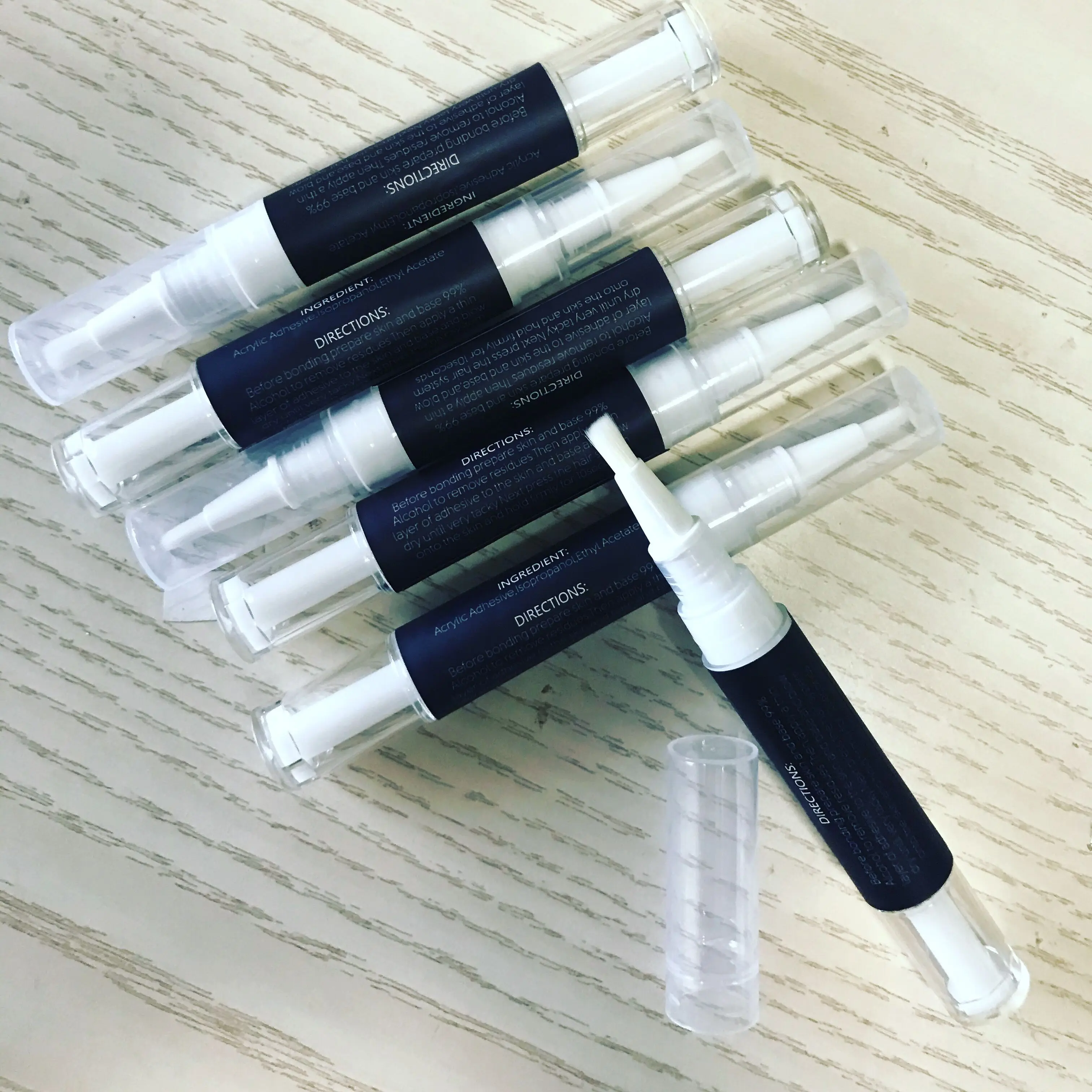 

Travel size easy to take extreme holding twisted lace adhesive glue brush pen