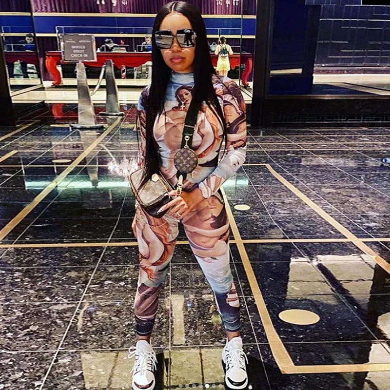 

European and American new autumn / winter 2020 foreign trade women's fashion printed long sleeve hip lifting sports Jumpsuit
