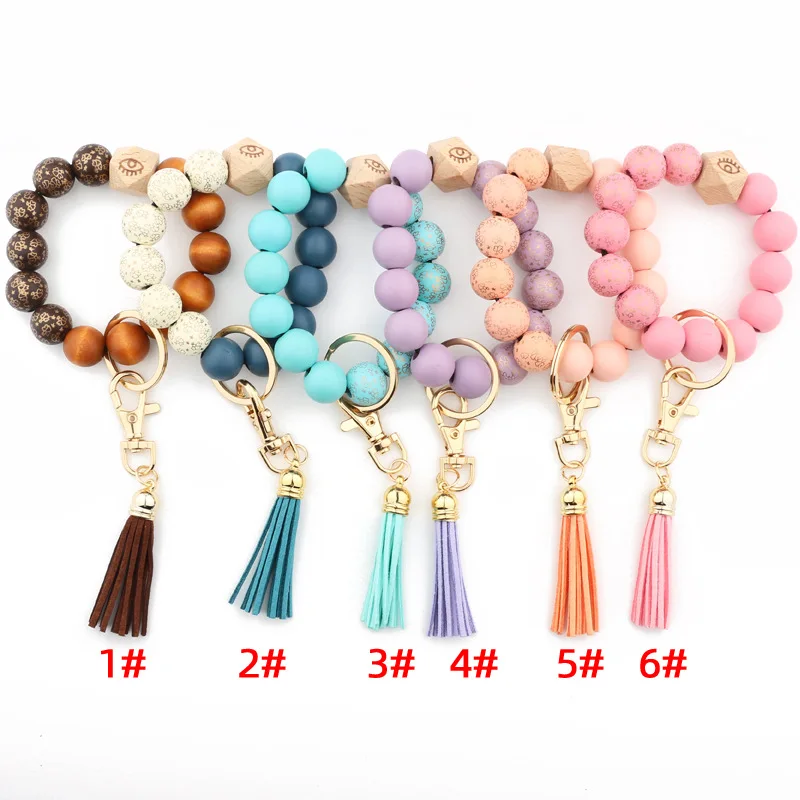 

Wholesale 6 Styles Colorful Speckled Wood Bead Keyring Wooden Bead Evil Eyes Tassel Wristlet Bracelet Keychain Custom Accessory