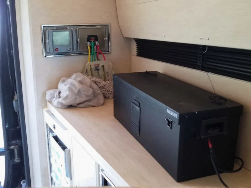 200Ah lithium battery mounted in camper van with wiring
