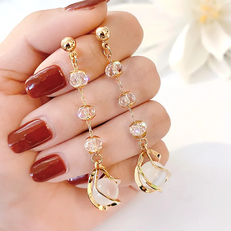 

Net red hot style European and American fashion wild long tassel earrings female S925 silver needle retro girl heart earrings, Picture