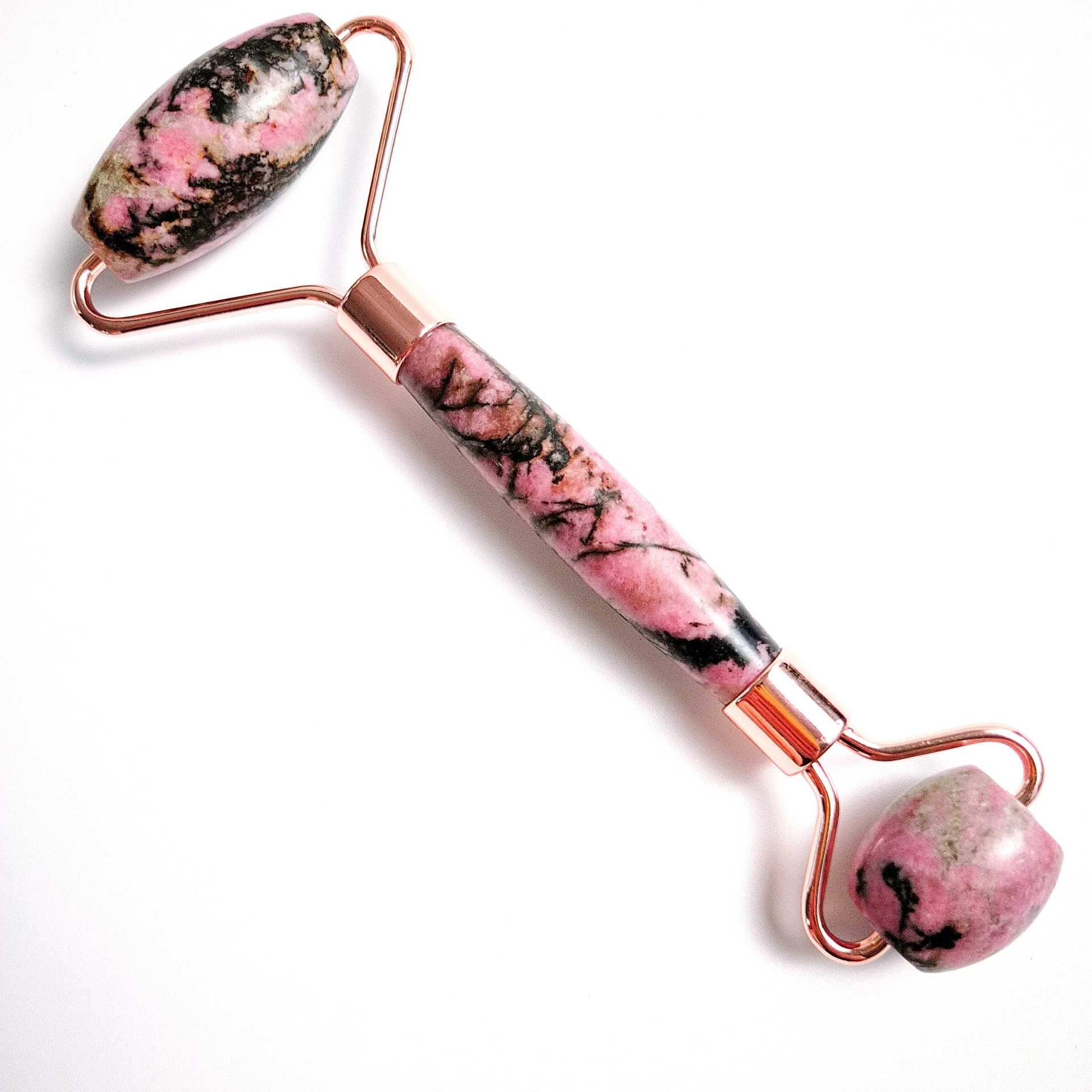 

Quartz facial roller. Rhodonite jasper Skin massager. Facial roller