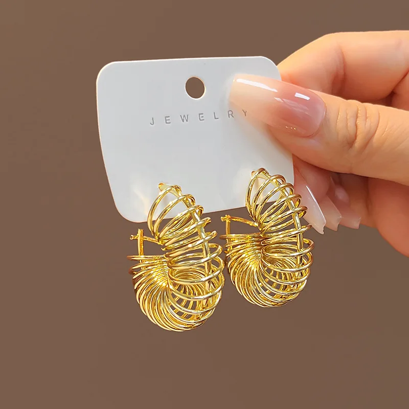 

Trendy Copper Twisting Catwalk With Spring Spiral Hollow Wire-wrapped Circle Hoop Earrings Jewelry Women