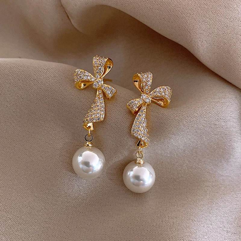 

New style 925 silver needle Bow Pearl Drop Earrings Pearl Dangle Earrings personality wholesale earrings, As the picture
