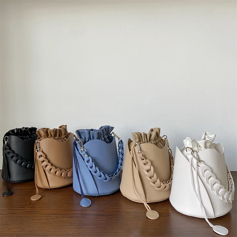 

2021 New arrival drawstring PU leather women hand bag unique handle handbag ladies bags bucket purse