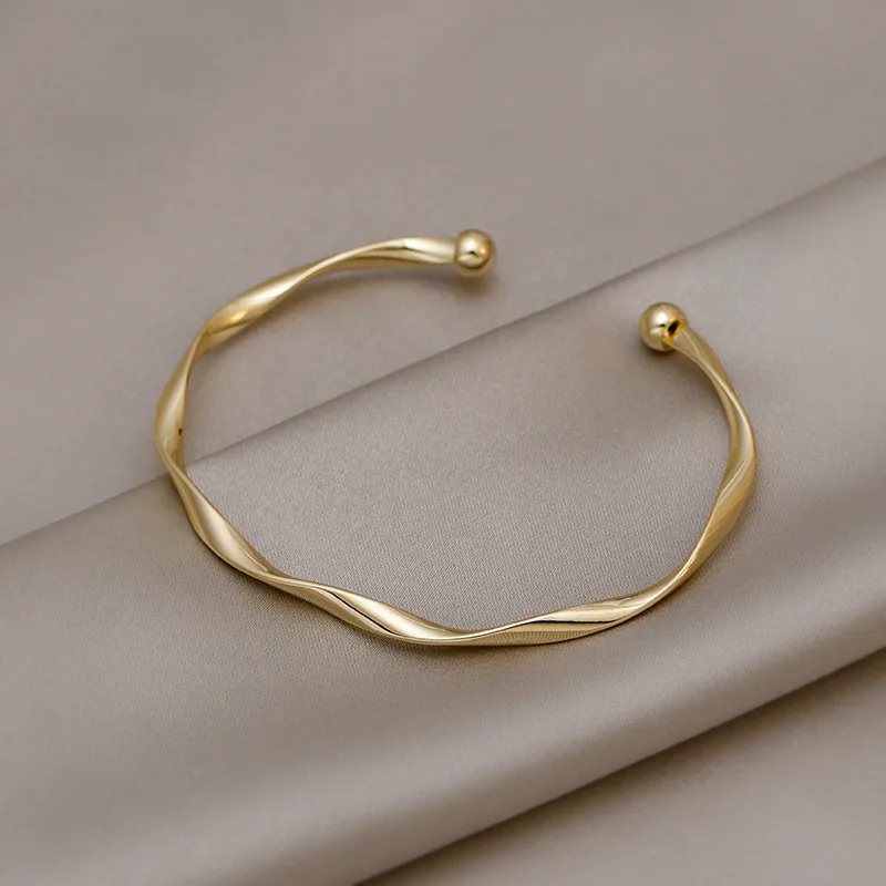 

Minimalism 18K Gold Plated Flat Twisted Bangle Bracelet Metal Twist Spiral Wave Opening Bangle