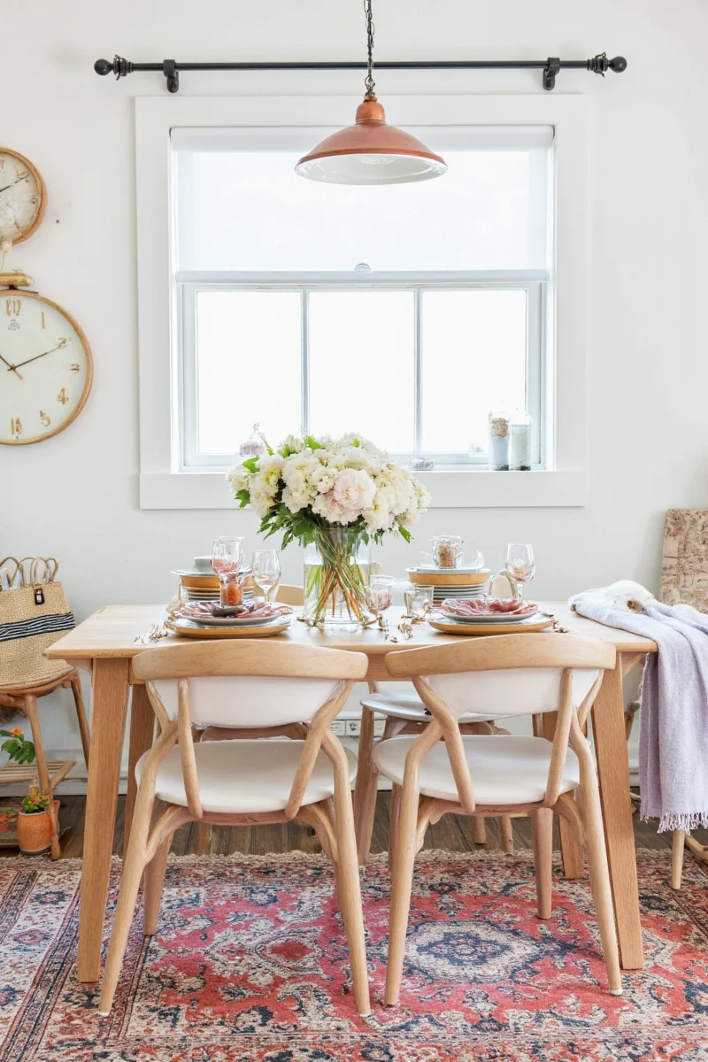 Peel-and-stick wallpaper in a small dining area