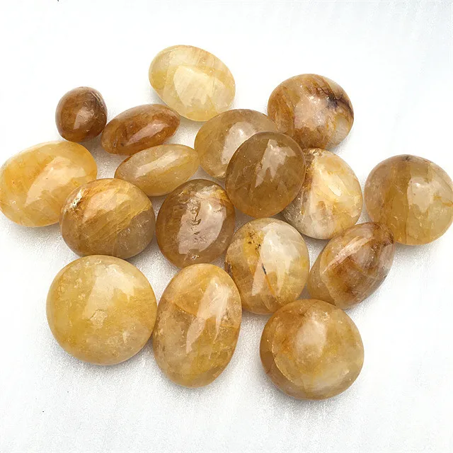 

Wholesale yellow crystal tumble stone golden healer Quartz palm for Home Decoration