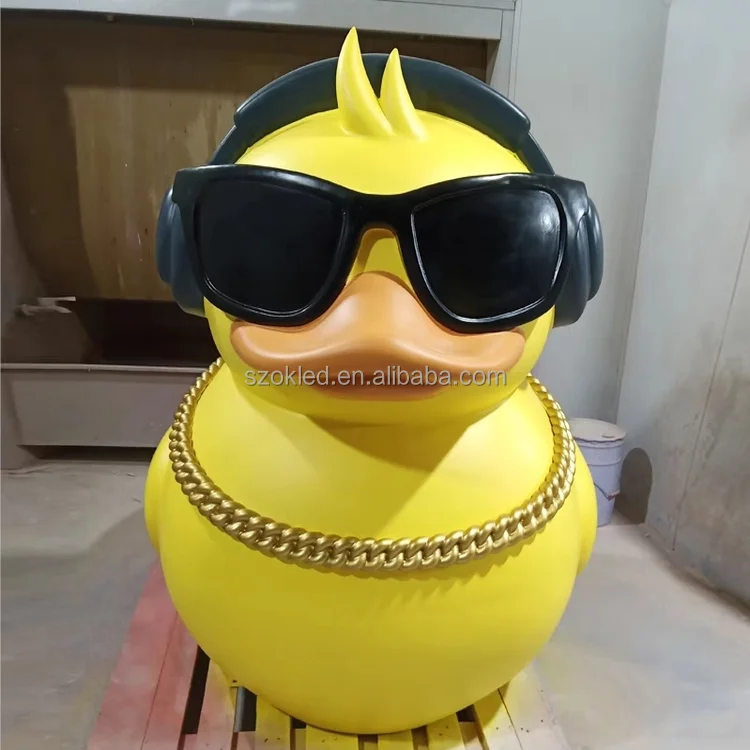 

shopping mall retail store decorations cartoon cute Wear sunglasses headphones a necklace duck fiberglass sculpture