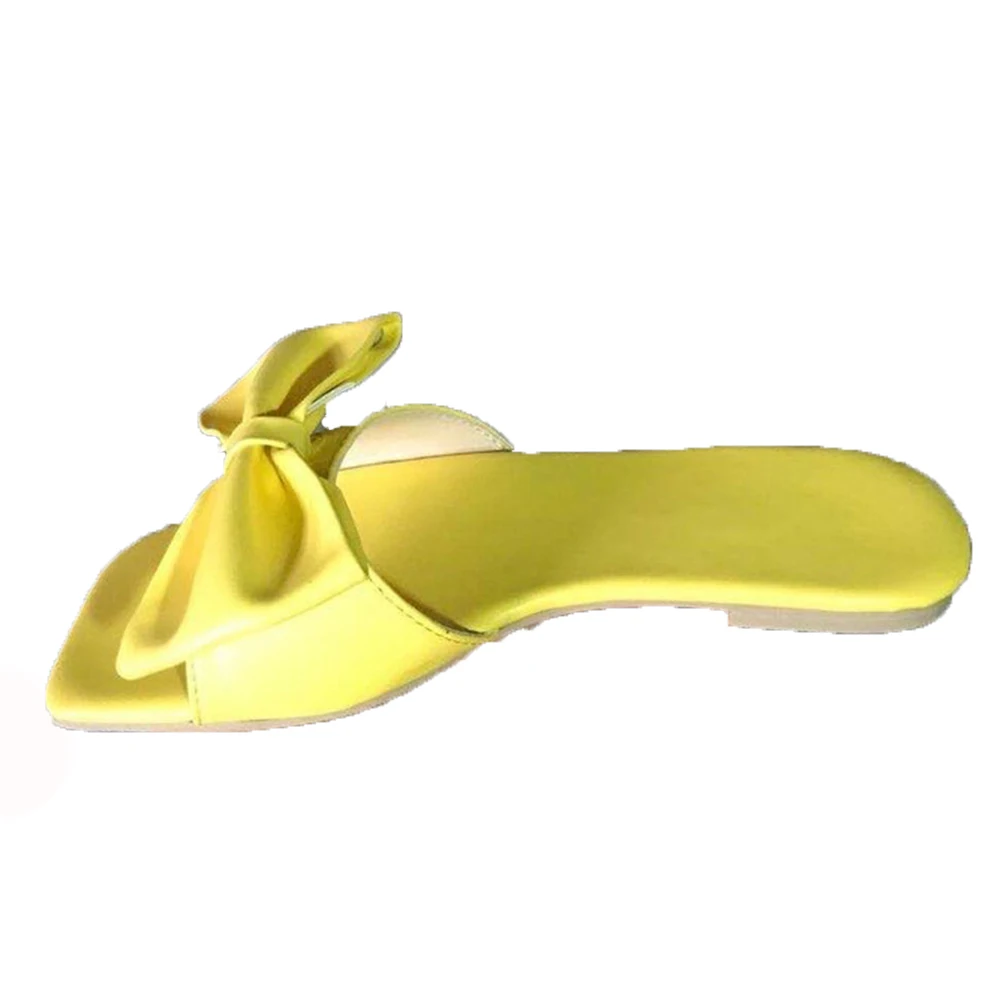 yellow flat sandals with bow
