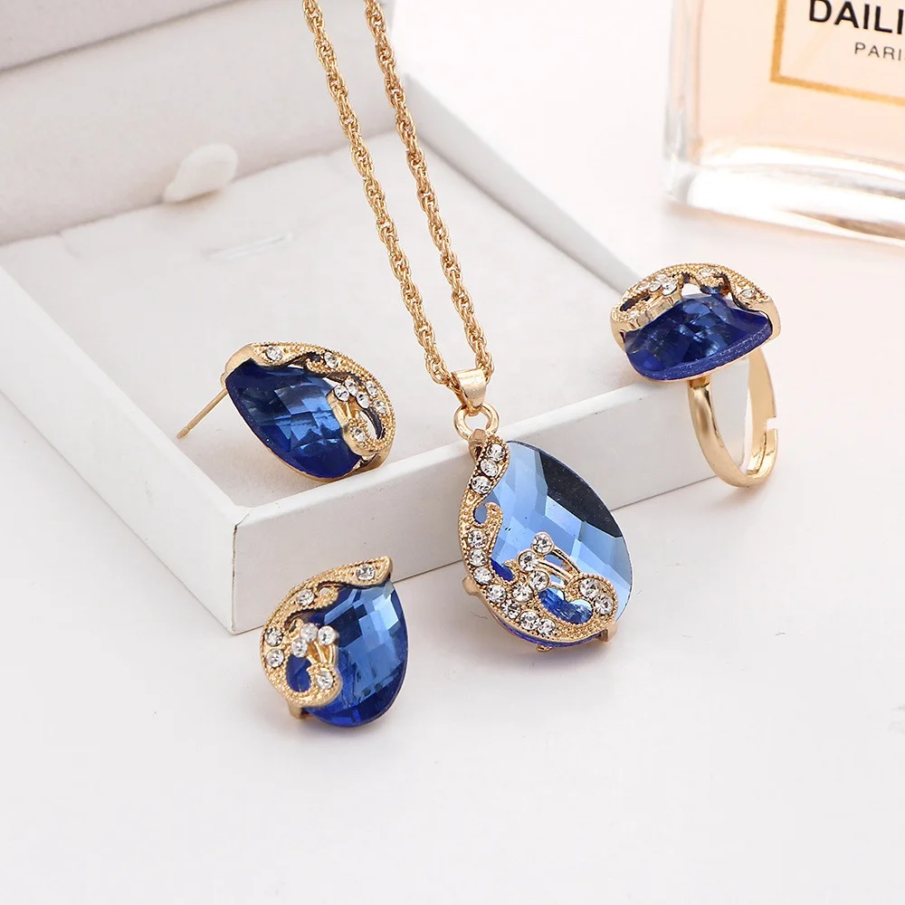 

Luxury Gold Plated Bride Wedding Crystal Water Drop Peacock Pendant Necklace Earrings Ring Jewelry Set