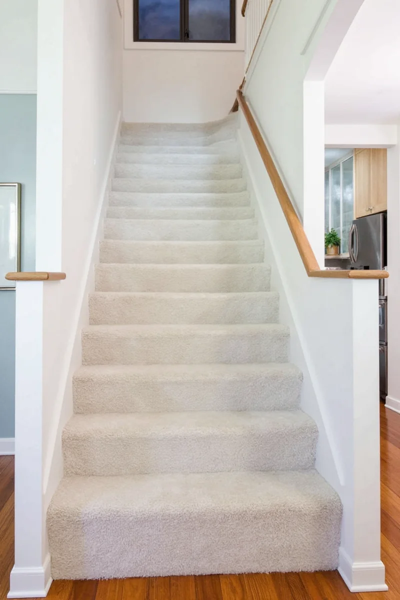 Baskets hanging from banister for storage