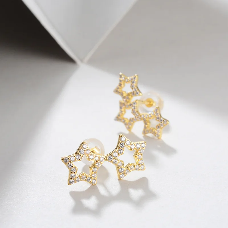 

Sterling silver 925 electroplating 18K gold star hollow five-pointed star earrings wholesale