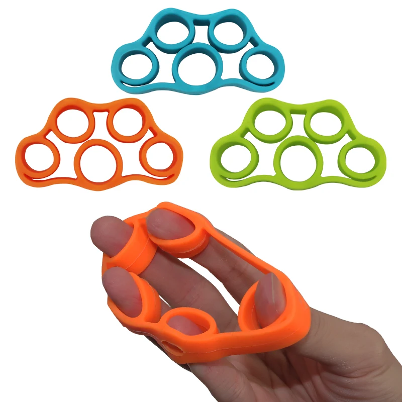 

The finger exerciser of different levels on the plane stretches the silicone finger resistance band, Green,orange and blue